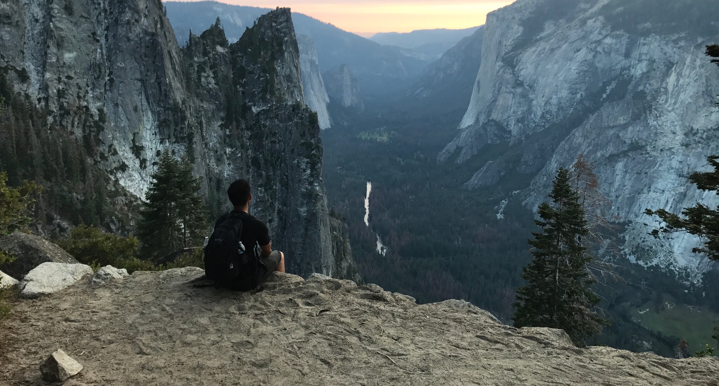 Elton overlooking a mountain valley